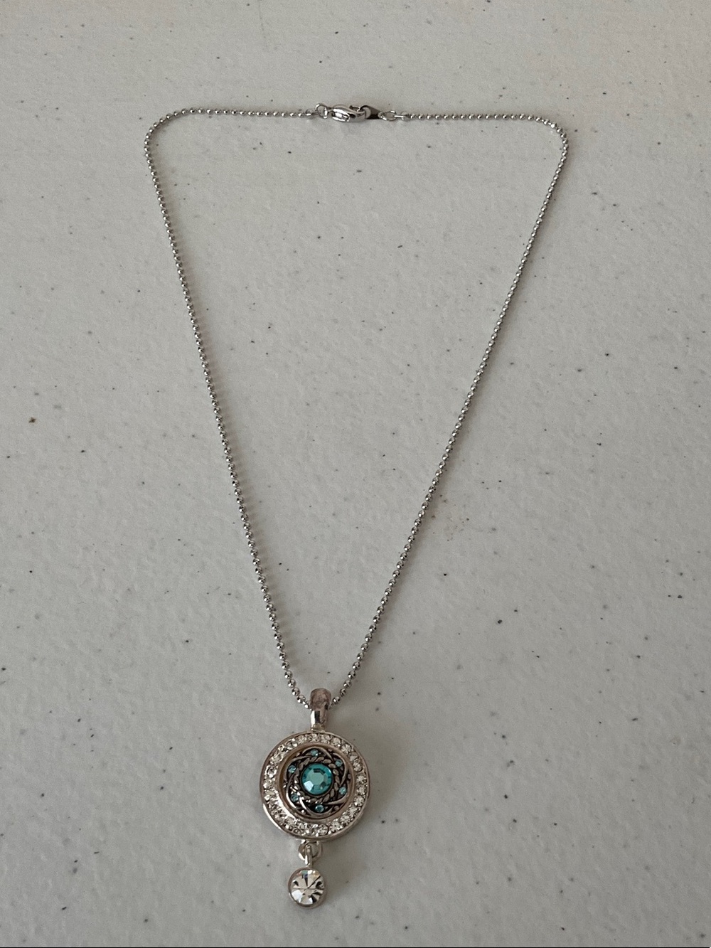 Silver Tone Necklace with Turquoise Accent Pendant